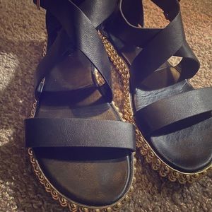 BLACK SANDALS WITH GOLD STUDS ON BOTTOM